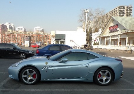 One blueish California and one red 458 Italia