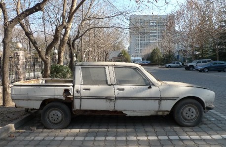 Spotted in China Peugeot 504 pickup in a Sorry State