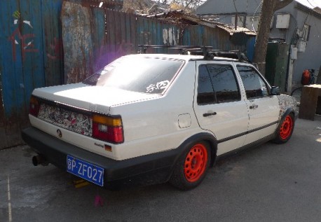 Volkswagen Jetta tuning China Roof rack big exhaust blacked out windows 