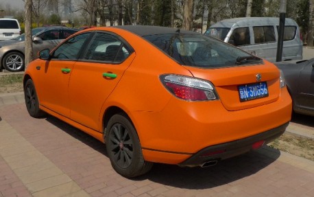 MG6 in matteorange Blackedout wheels ad more cool