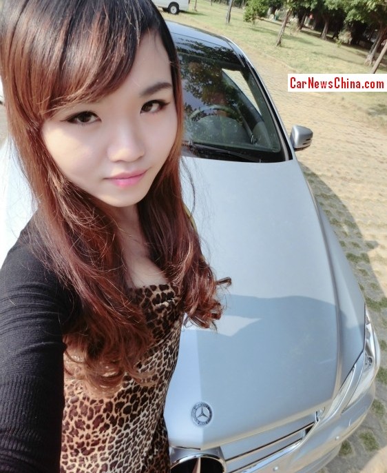Pretty Chinese Girl is very Tiger with a Mercedes-Benz 